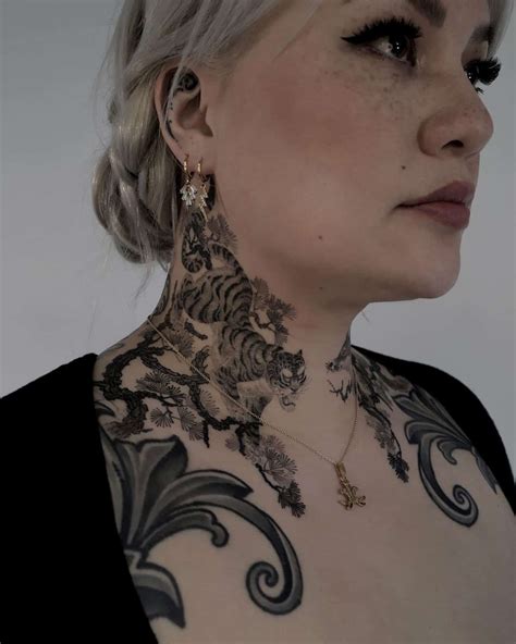 throat tattoos woman|feminine neck tattoos for women.